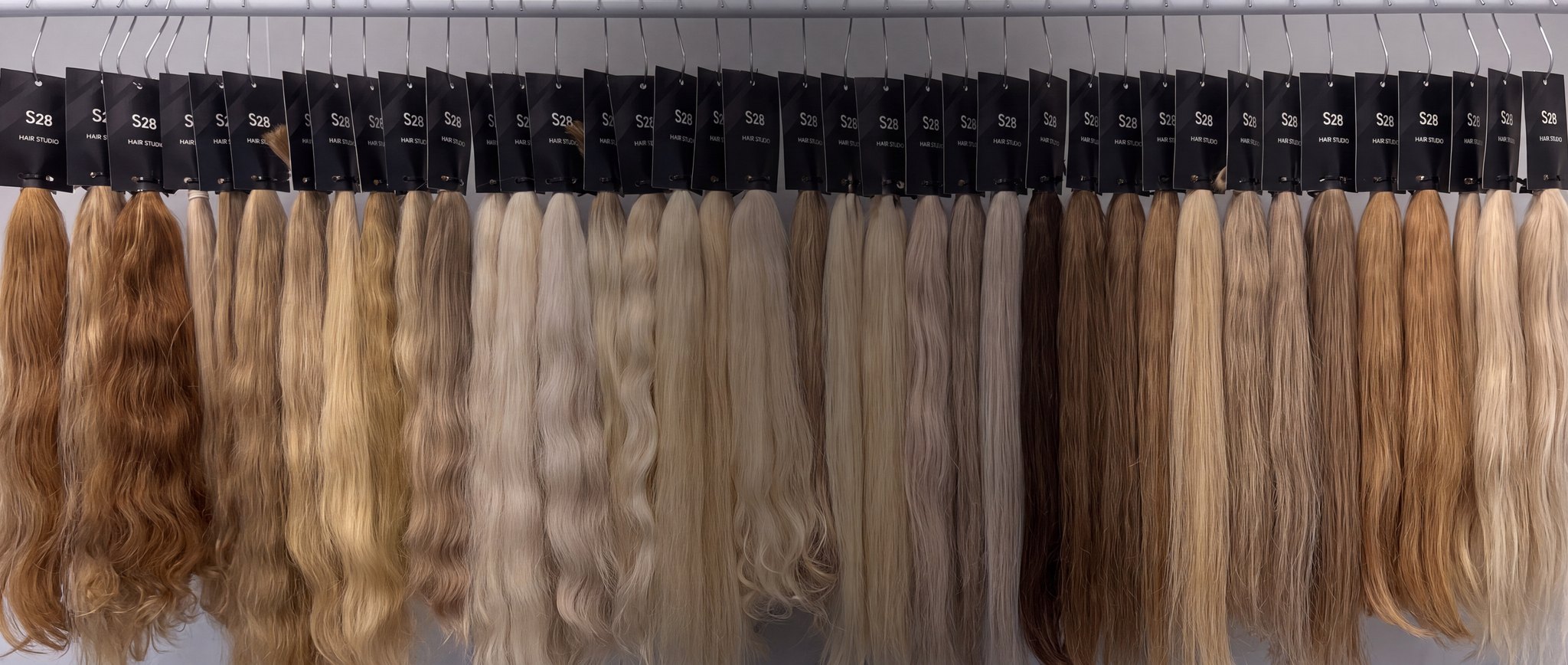 Hair samples in different shades and textures at S28 Hair Extension
