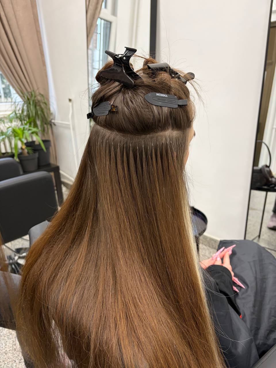Close-up of capsule bonds for hair extensions