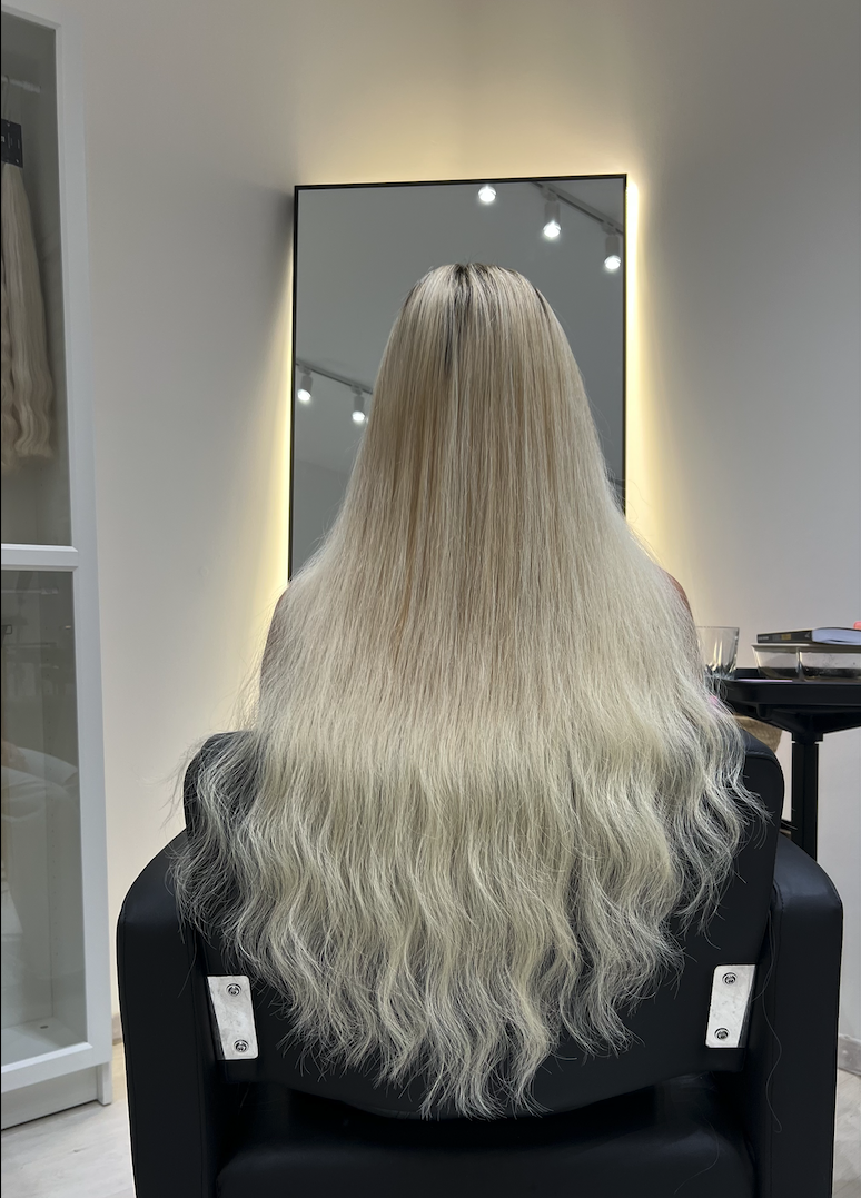 Long sleek black hair after extension maintenance
